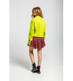 Falda mini con volante y estampado animal print en tonos naranja, fucsia y negro I’m Felina