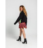 Falda mini con volante y estampado animal print en tonos naranja, fucsia y negro I’m Felina