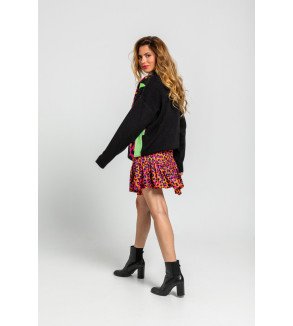 Falda mini con volante y estampado animal print en tonos naranja, fucsia y negro I’m Felina