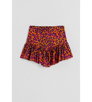 Falda mini con volante y estampado animal print en tonos naranja, fucsia y negro I’m Felina