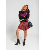 Falda mini con volante y estampado animal print en tonos naranja, fucsia y negro I’m Felina