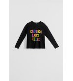 Camiseta oversize negra con mensaje Caótica Loca Feliz y estampado animal print