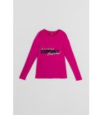 Camiseta oversize fucsia con texto “Si la vida te da curvas, ¡presúmelas!” – Guapa